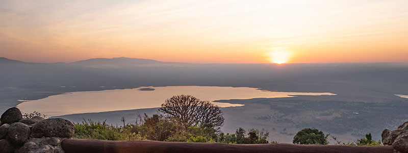 a view of Ngorongoro Crater at sunset